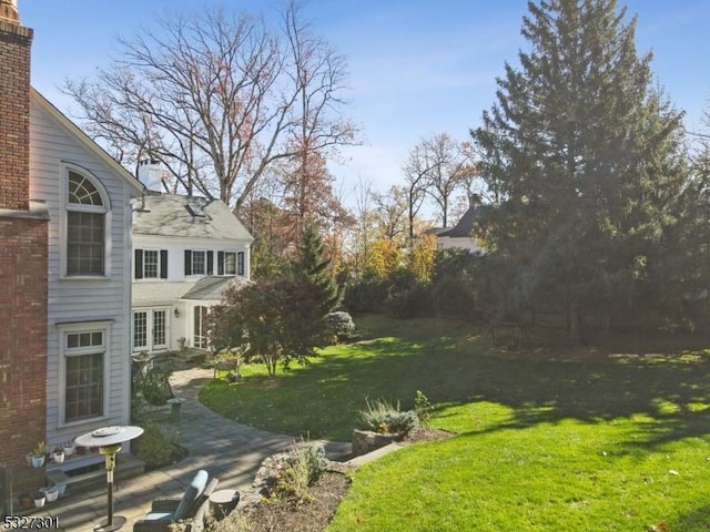 view of yard with a patio area