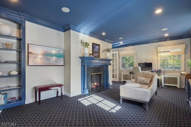 living room featuring dark colored carpet, built in shelves, and a healthy amount of sunlight