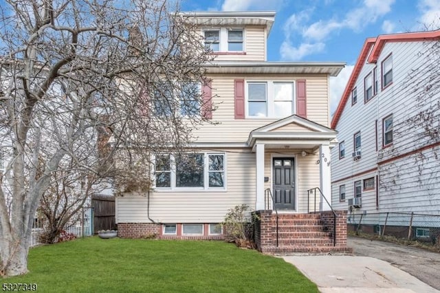 view of front of house with a front lawn