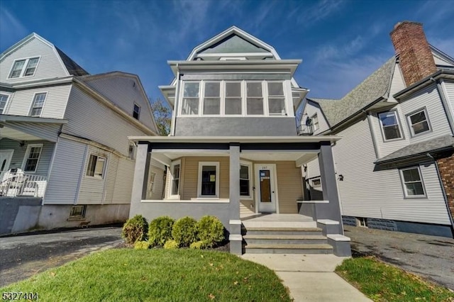 view of front of home featuring covered porch