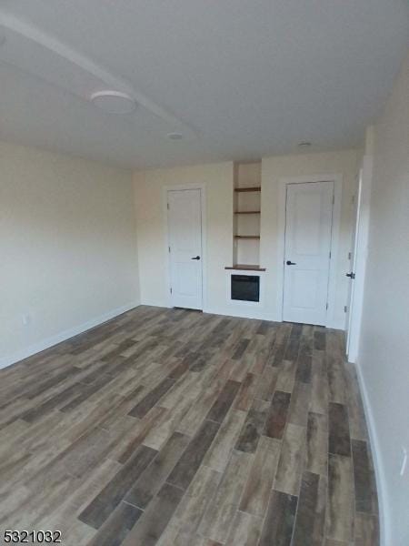 interior space featuring dark wood-type flooring