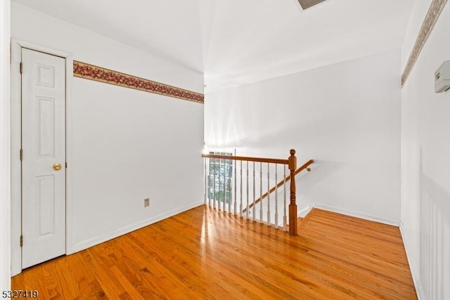 empty room featuring hardwood / wood-style floors