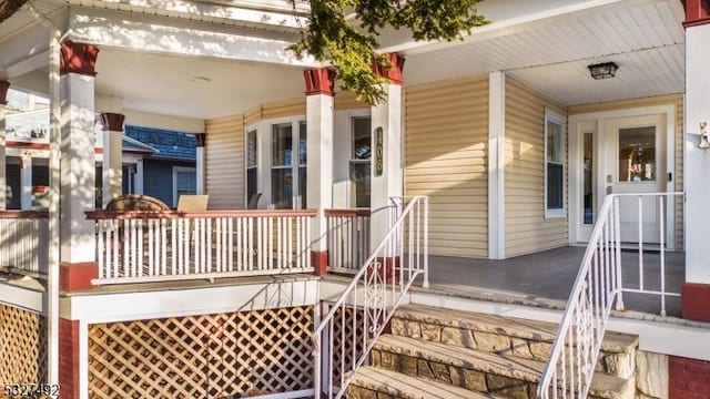 property entrance with a porch