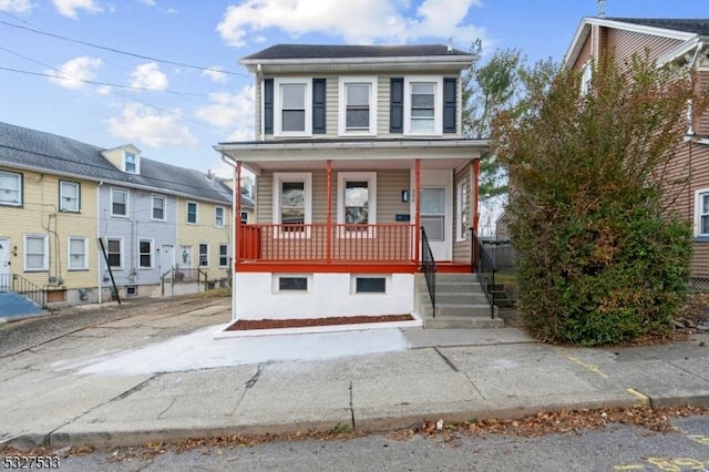 view of front of property featuring covered porch