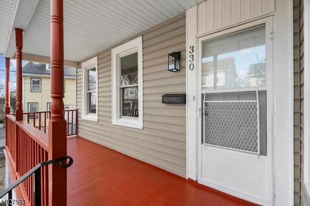 entrance to property with a porch