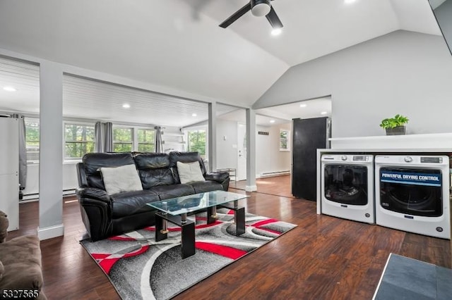 living room featuring dark hardwood / wood-style flooring, washer and clothes dryer, baseboard heating, ceiling fan, and lofted ceiling