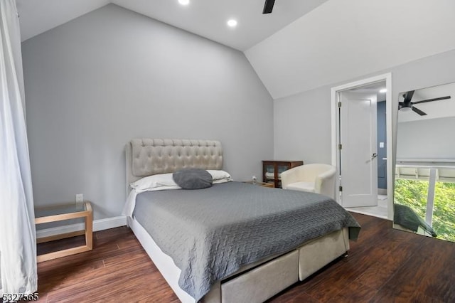 bedroom with ceiling fan, dark wood-type flooring, and lofted ceiling