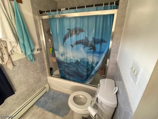 bathroom featuring enclosed tub / shower combo, a baseboard radiator, and toilet