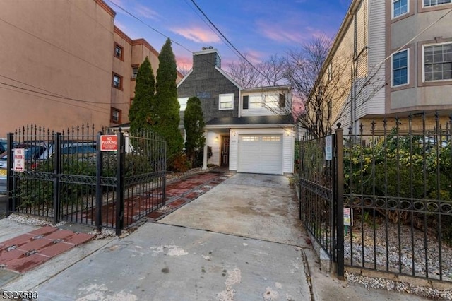 front of property with a garage