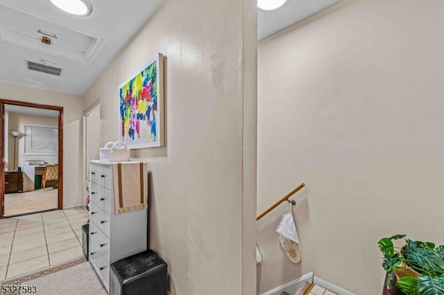 corridor featuring light tile patterned floors