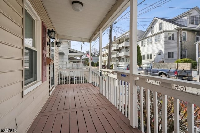 wooden terrace featuring a porch