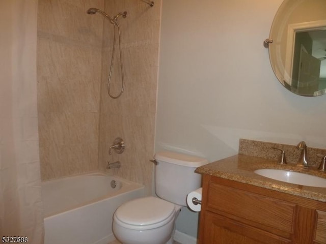 full bathroom with shower / tub combo with curtain, vanity, and toilet