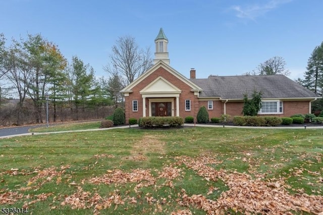 exterior space with a front lawn