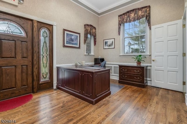 office space featuring dark hardwood / wood-style flooring and crown molding