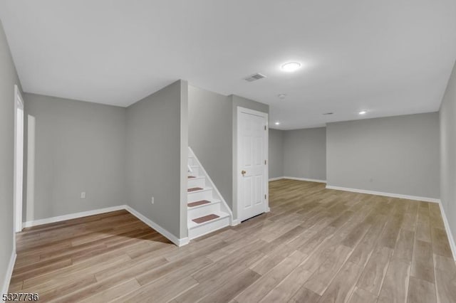 basement with light wood-type flooring