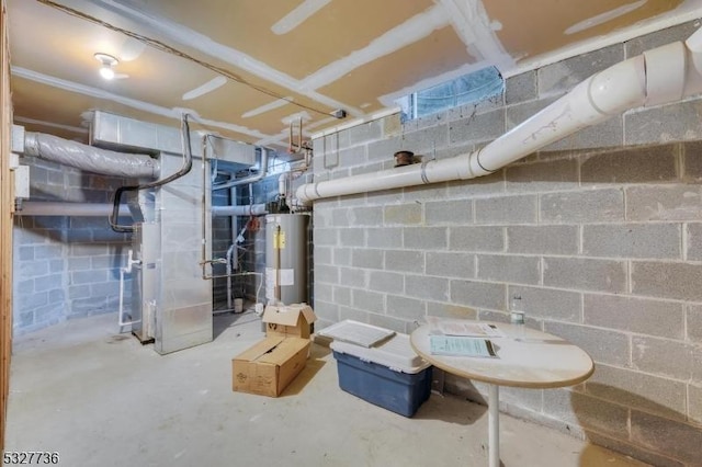 basement featuring heating unit and water heater