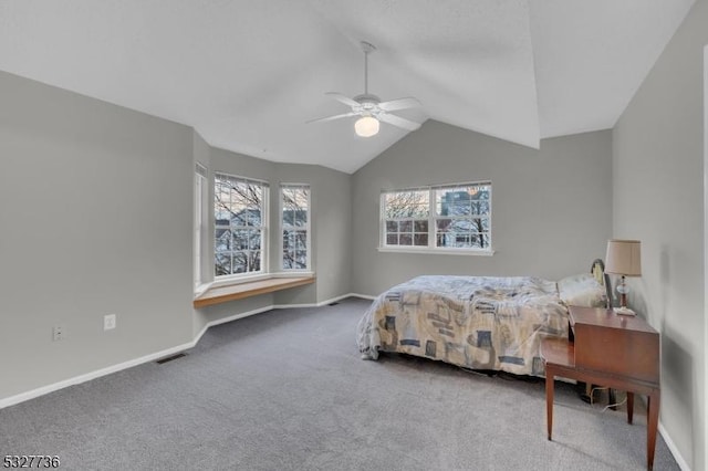 carpeted bedroom featuring ceiling fan and lofted ceiling