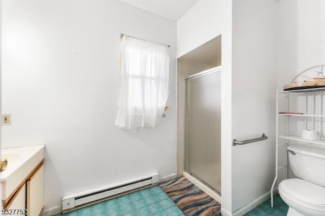 bathroom with vanity, a baseboard radiator, toilet, and walk in shower