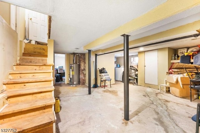 basement featuring washer / clothes dryer and gas water heater