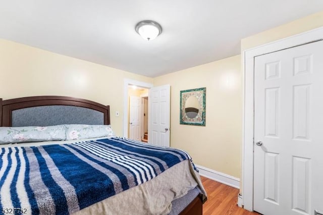 bedroom with light hardwood / wood-style floors