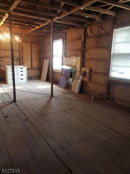 basement featuring light wood-type flooring