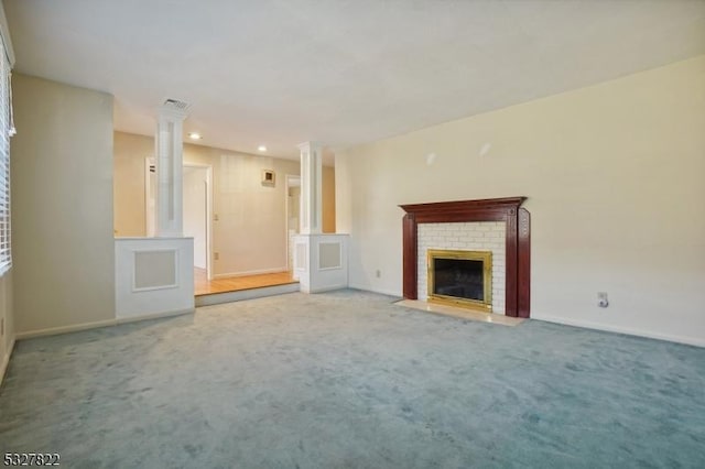 unfurnished living room featuring a fireplace and carpet floors