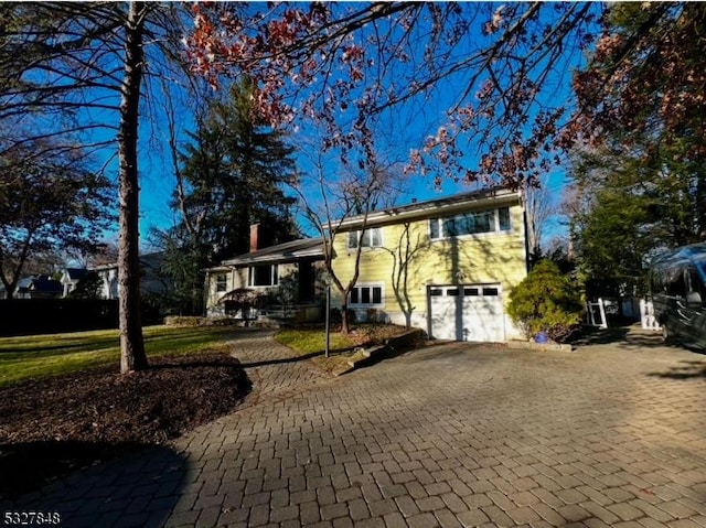 view of front of house with a garage