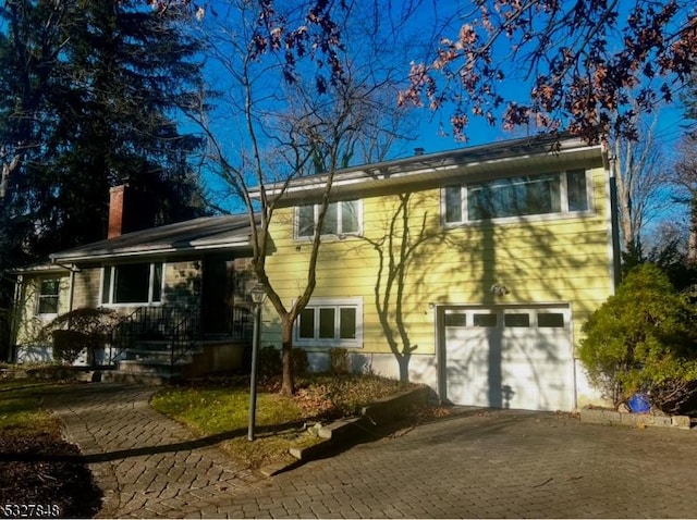 exterior space with a garage