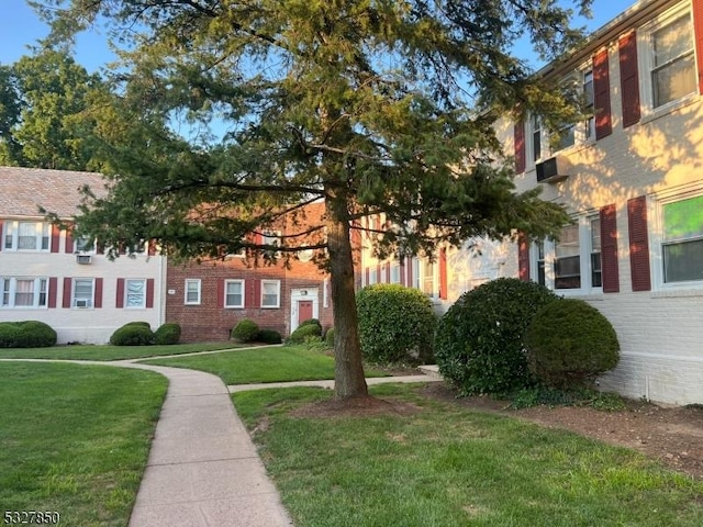 exterior space with a lawn