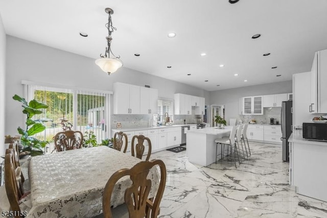 dining area featuring sink