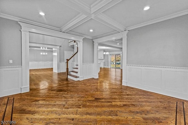 interior space with beam ceiling, crown molding, and dark wood-type flooring