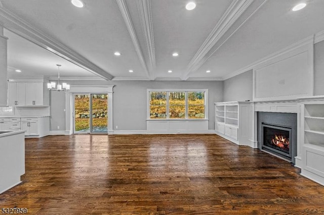 unfurnished living room featuring plenty of natural light, dark hardwood / wood-style floors, and beam ceiling