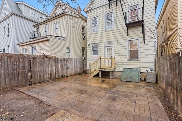 rear view of house with a patio area