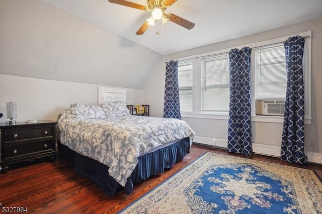 bedroom with ceiling fan, dark hardwood / wood-style floors, and lofted ceiling