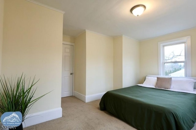 bedroom featuring crown molding and light carpet