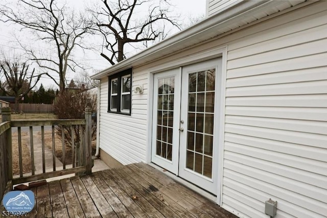 wooden deck featuring french doors