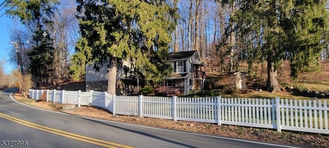 view of property hidden behind natural elements