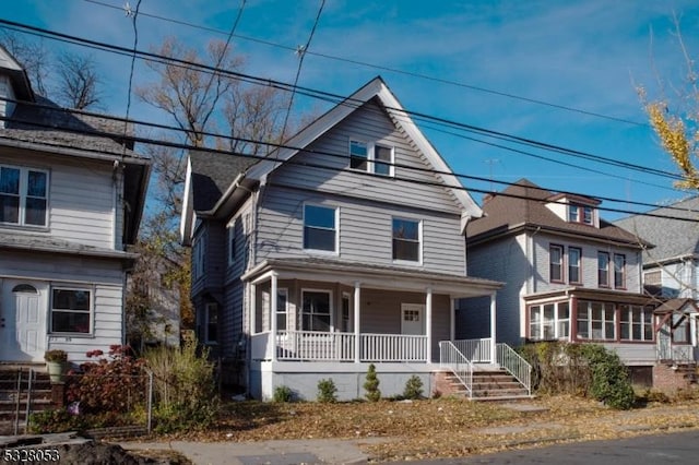 view of property featuring a porch