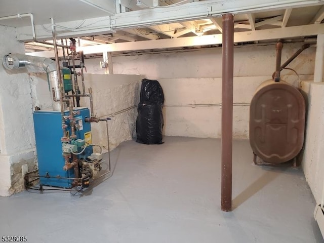 basement with a baseboard heating unit