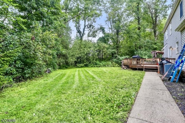 view of yard featuring a deck