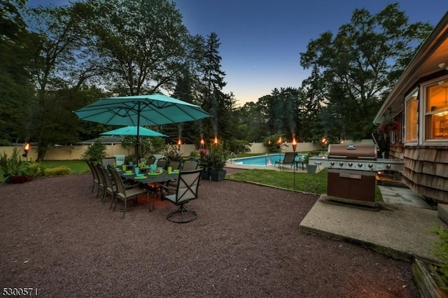 exterior space with a patio and a fenced in pool