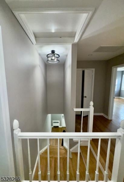 stairway featuring hardwood / wood-style flooring