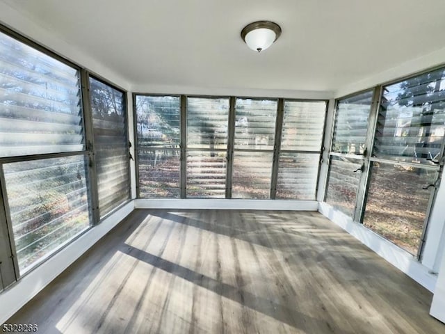 unfurnished sunroom with a healthy amount of sunlight