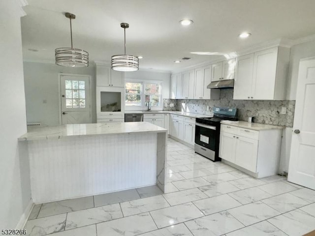 kitchen with kitchen peninsula, appliances with stainless steel finishes, light stone counters, pendant lighting, and white cabinetry