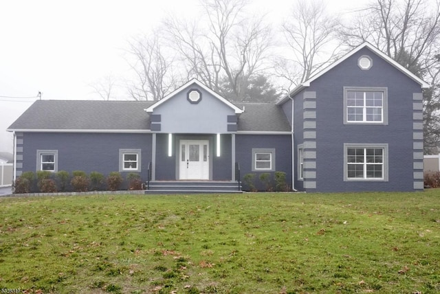 front facade with a front lawn