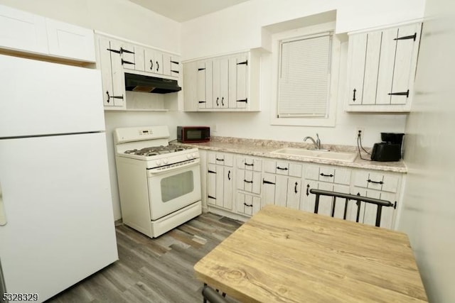 kitchen with dark hardwood / wood-style flooring, white appliances, white cabinetry, and sink