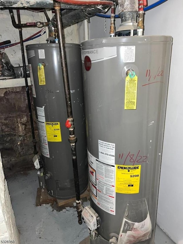 utility room featuring gas water heater