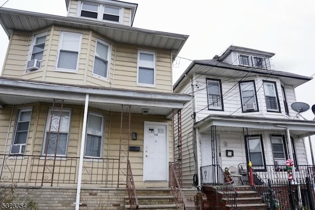 view of front facade with cooling unit