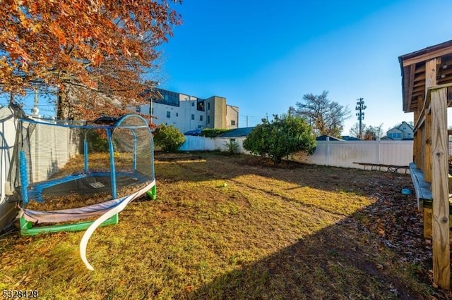 view of yard featuring a trampoline