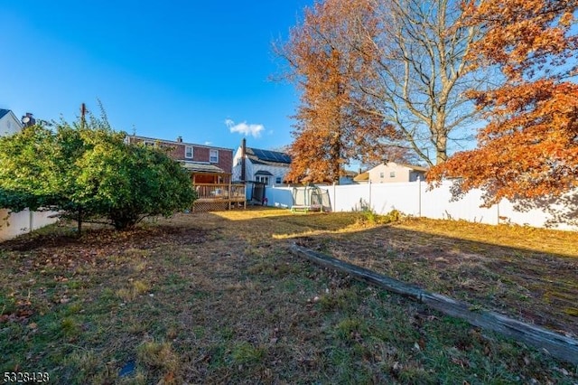 view of yard featuring a deck